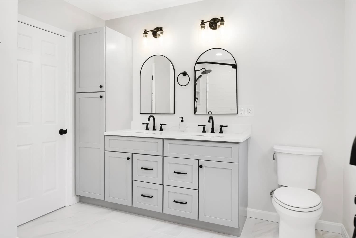 modern vanity on new white tile floors