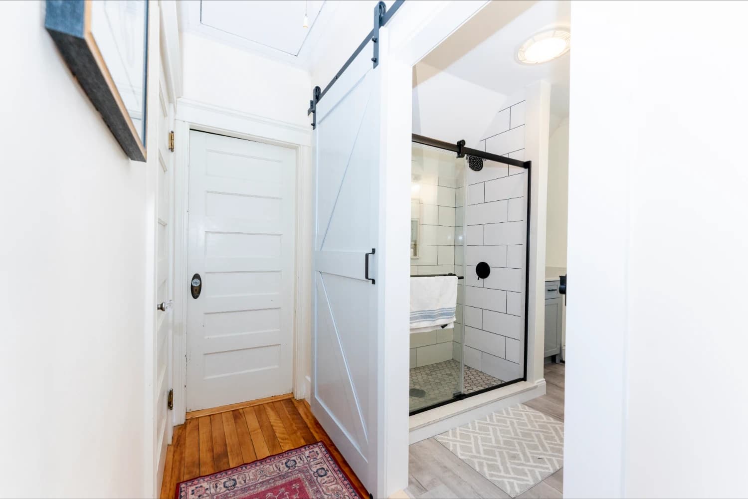 new bathroom renovated barn door and shower